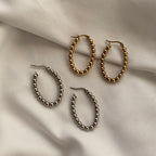 Brincos com bolinhas