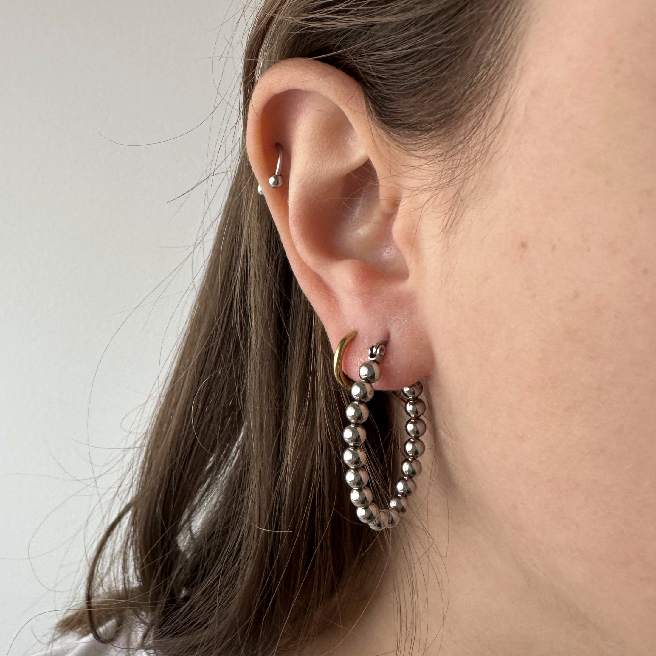 Brincos com bolinhas