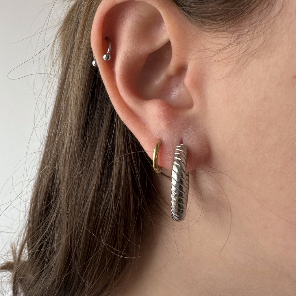 Brincos com efeito cortado