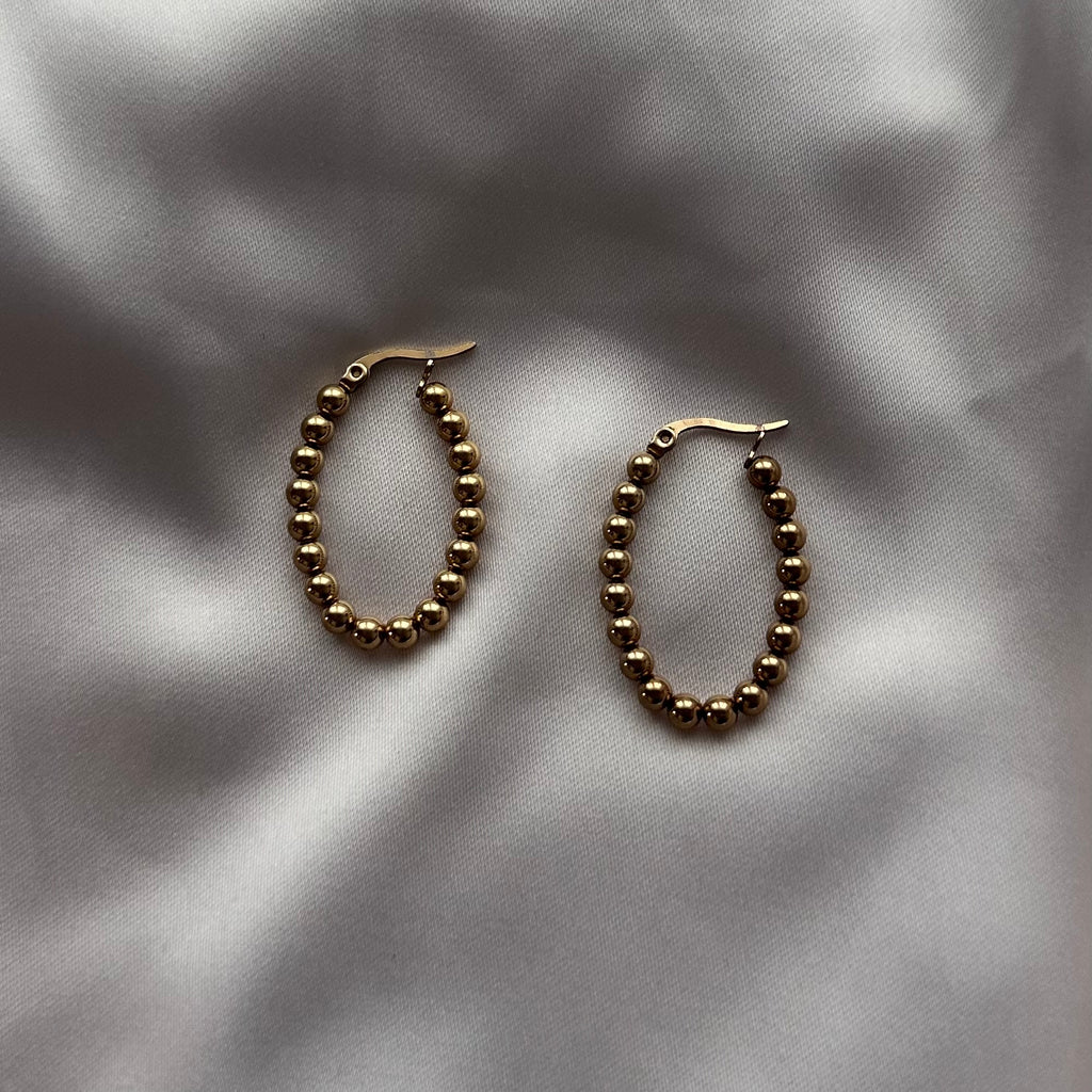 Brincos com bolinhas