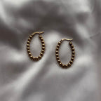 Brincos com bolinhas